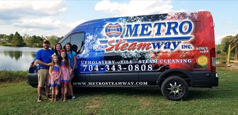 The Sniatecki family beside the Metro Steamway van in Charlotte NC